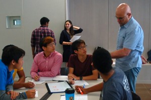Students receive input from CS professor Luay Nakhleh